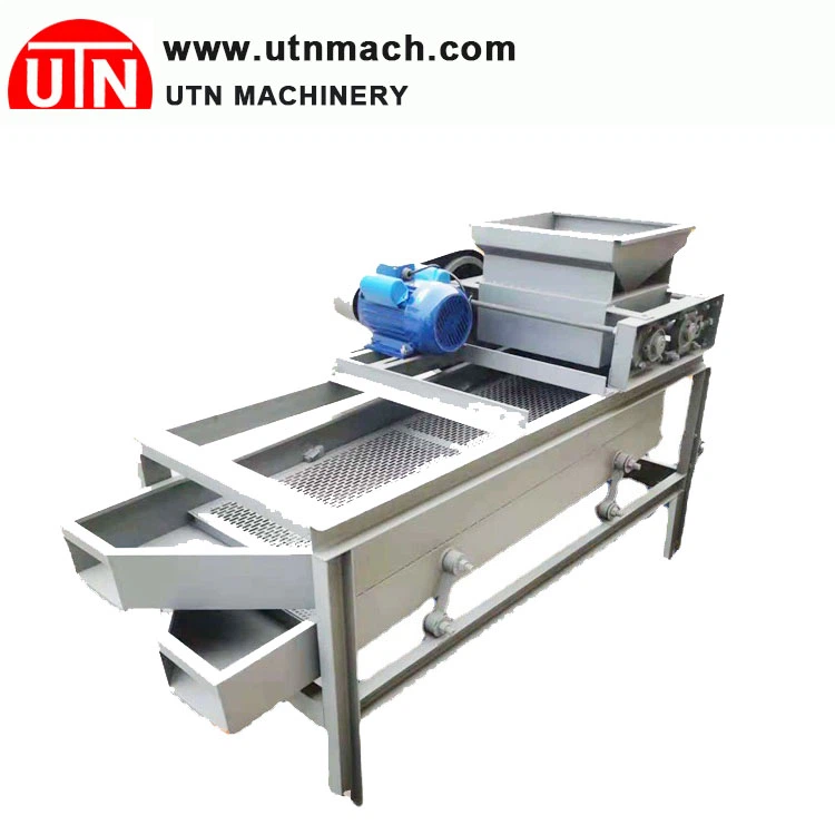 बादाम गोलाबारी मशीन